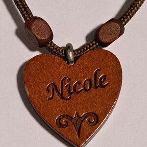Wooden heart necklace with the name Nicole